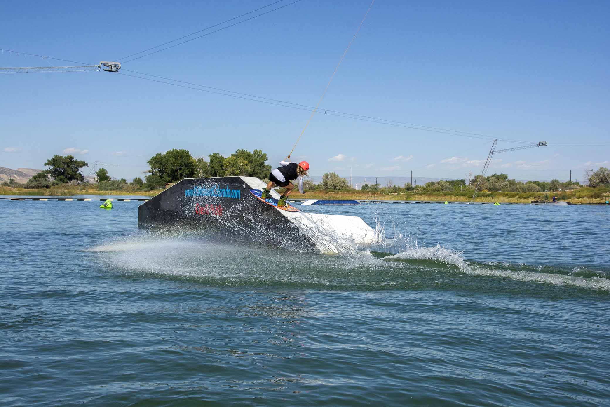 A woman wakeboarding.