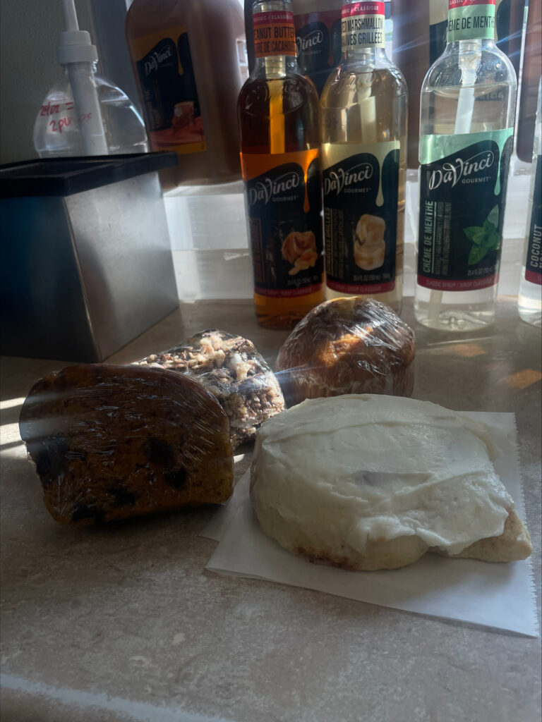 Chocolate pumpkin bread, a cinnamon role, muffin, and Rice Krispy treat from Morning Mission Coffee.