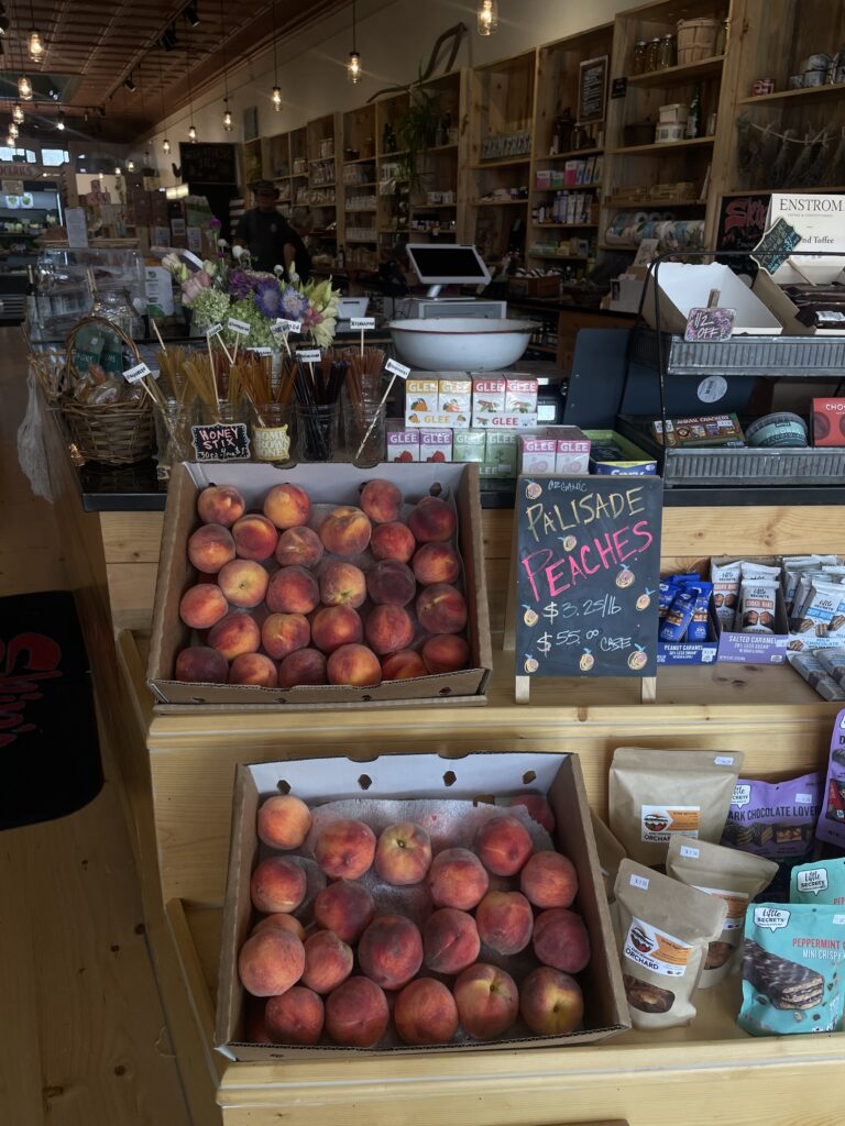 Palisade peaches in boxes at Skip's Farm to Market.