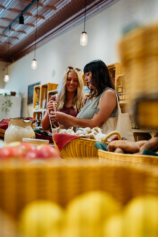 Two women shop at Skip's Farm to Market.