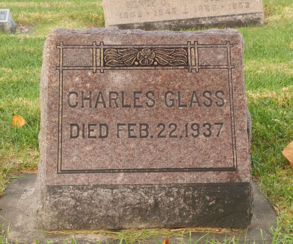 Charlie Glass' headstone says his name and the day he passed, February 22, 1937.