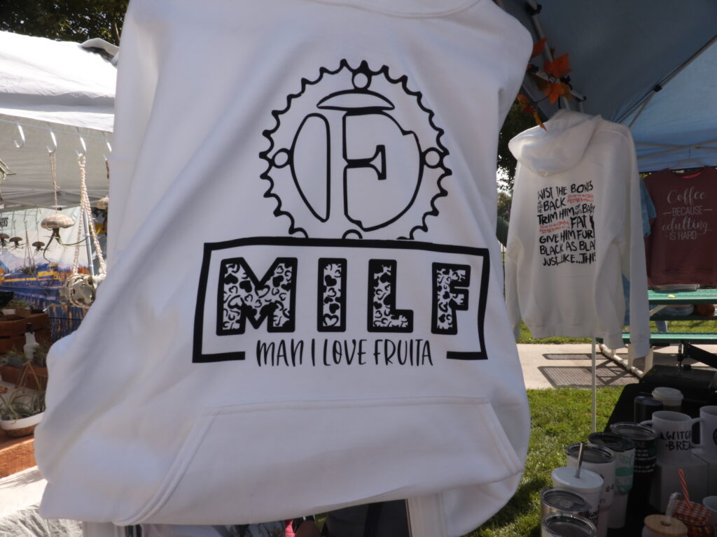 A white sweatshirt that says "Man I Love Fruita."