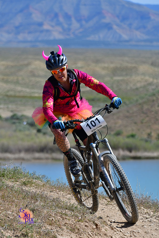 A woman in a pink tutu rides during the 18 Hours of Fruita race.