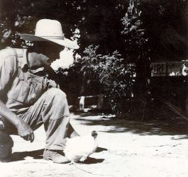 A Farmer with Mike the Headless Chicken.